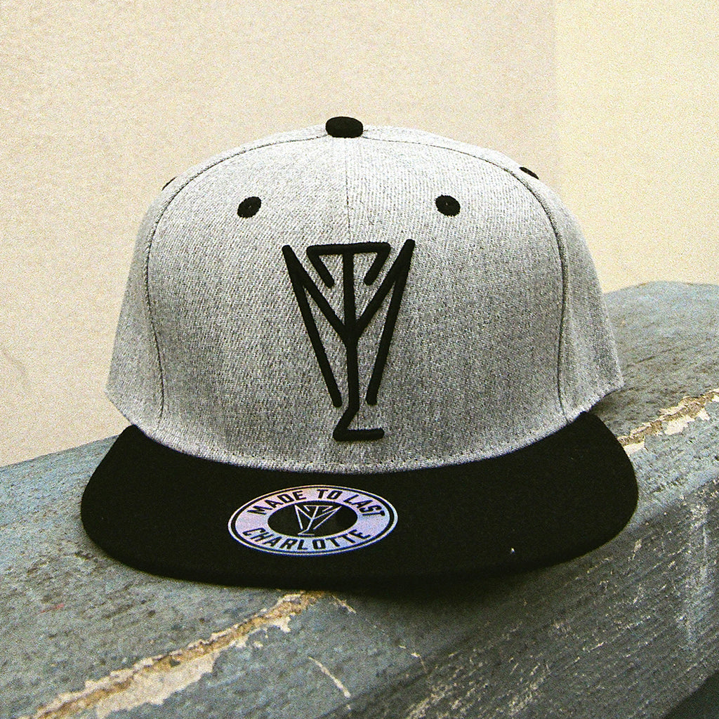 Grey Symbol Snapback Hat
